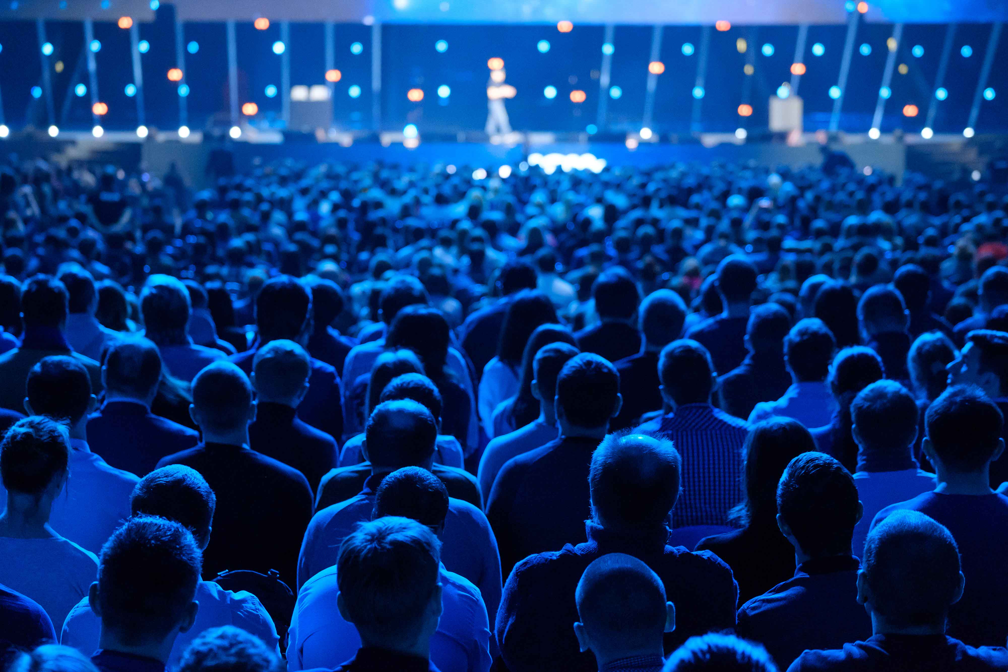 crowd sitting at a conference